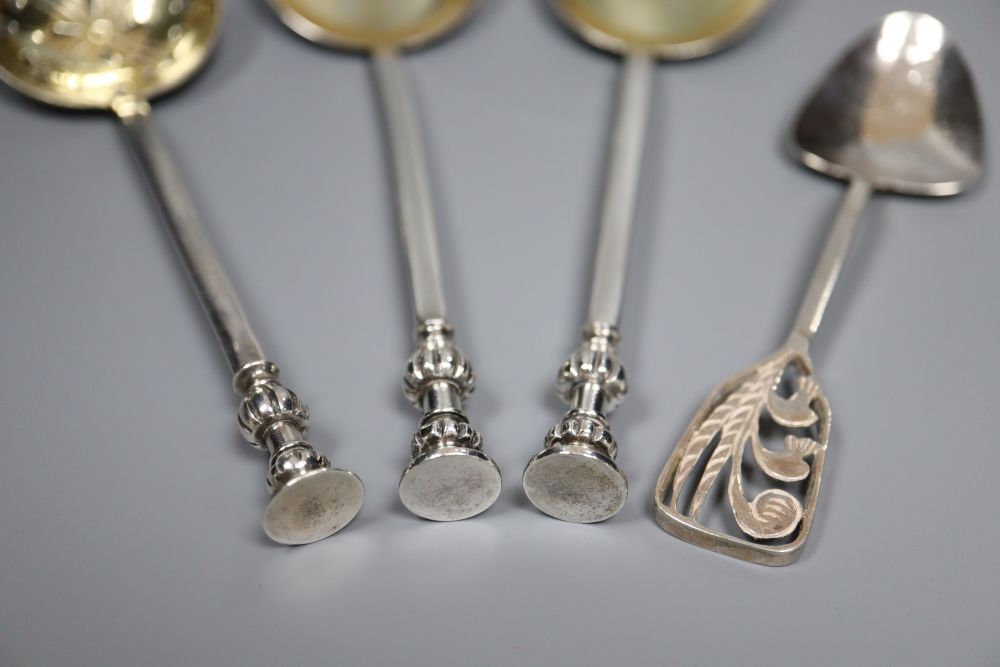 A pair of George V silver seal top serving spoons by Mappin & Webb, a silver sifter spoon, pair of silver tongs etc.